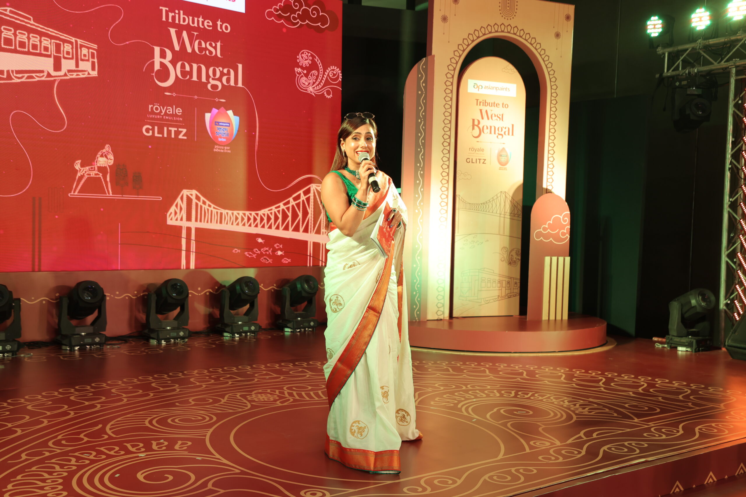 Emcee Abhilasha hosting a launch event for Asian Paints in Kolkata