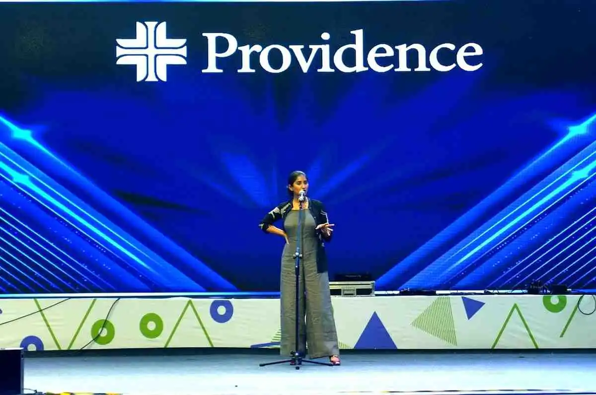 Comedian Aiyyo Shraddha performing at a corporate event in Hyderabad
