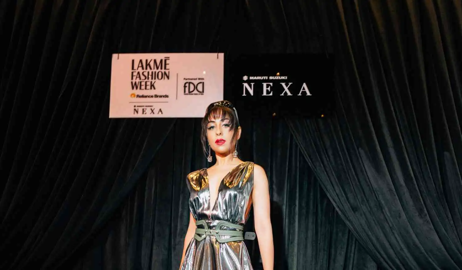 Emcee Ayesha Adlakha hosting a corporate event in Mumbai