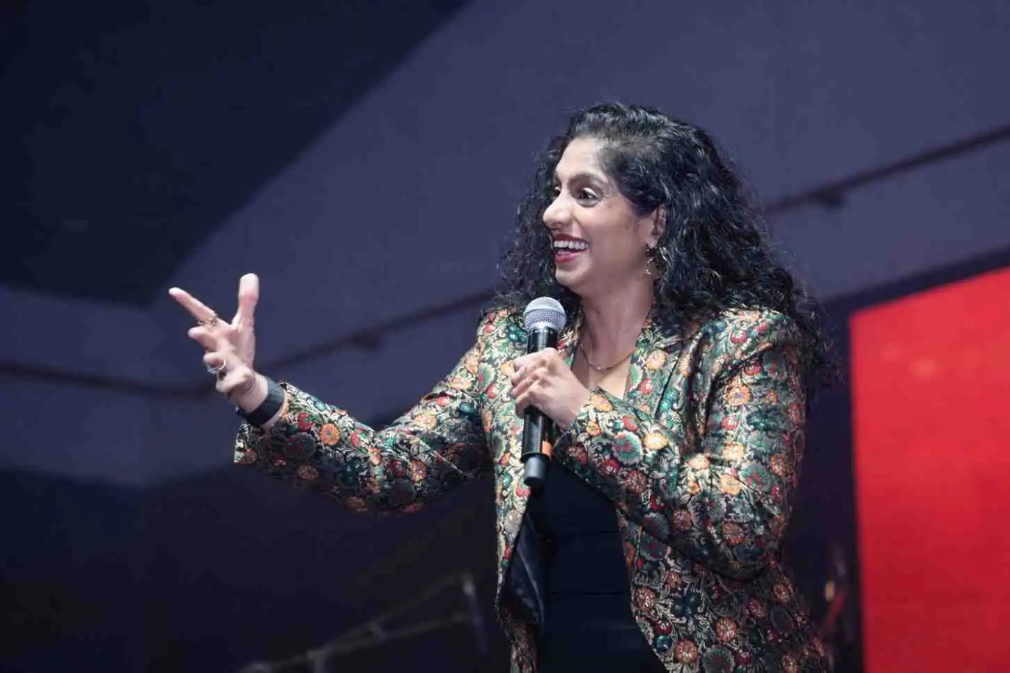 Comedian Jamie Lever performing at a corporate event in Bangalore