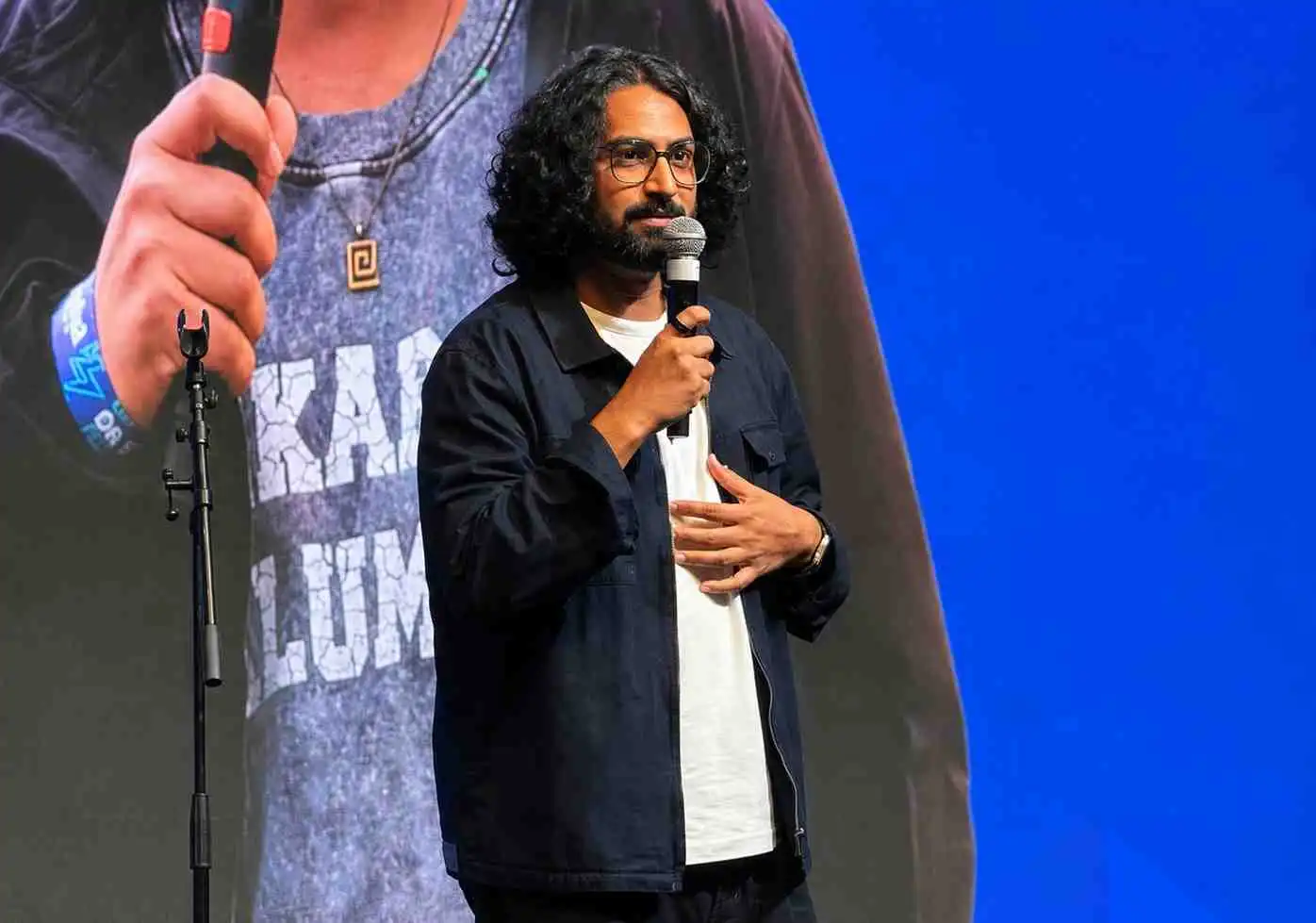 Comedian Ravi Gupta performing at a corporate event in Delhi