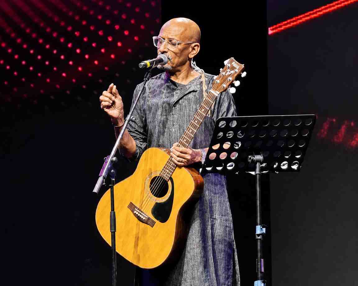 Composer Shantanu Moitra performing at a corporate event in Mumbai