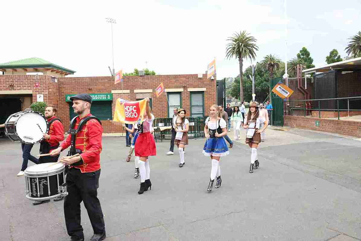 Drummers and themed hostesses welcoming guests at a corporate event in Sydney