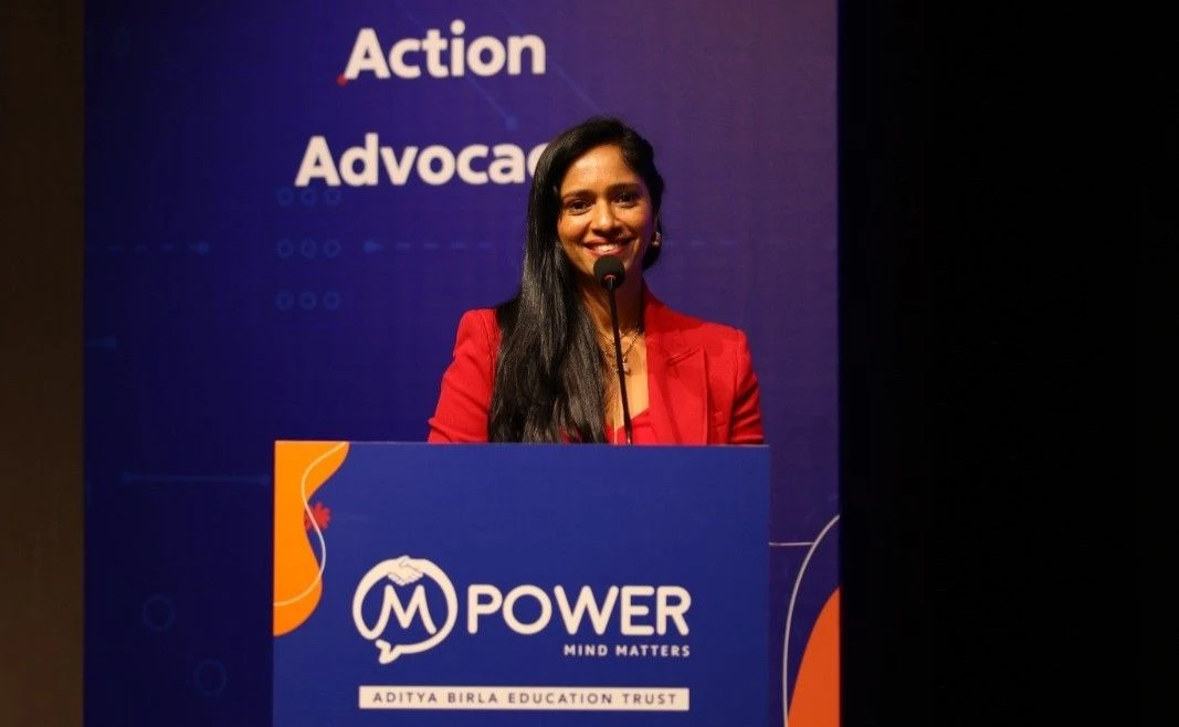 Emcee Anitha hosting a corporate event in Bangalore