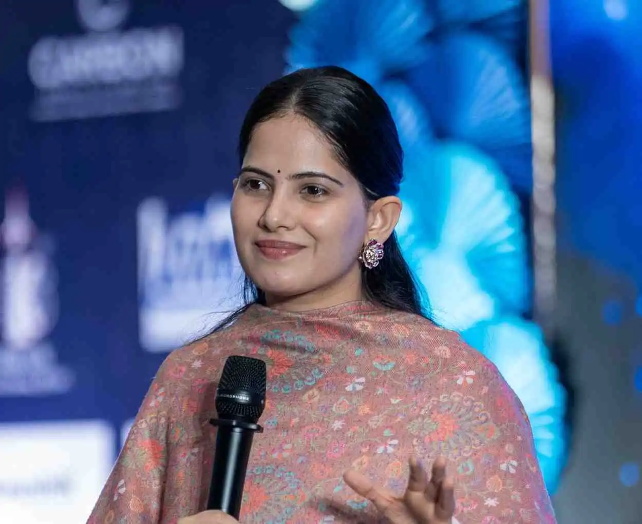 Jaya Kishori as a guest speaker at a corporate event in Ahmedabad