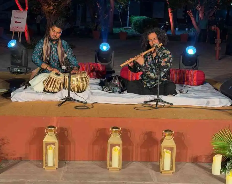 Flautist performing with a tabla player a corporate event in Delhi