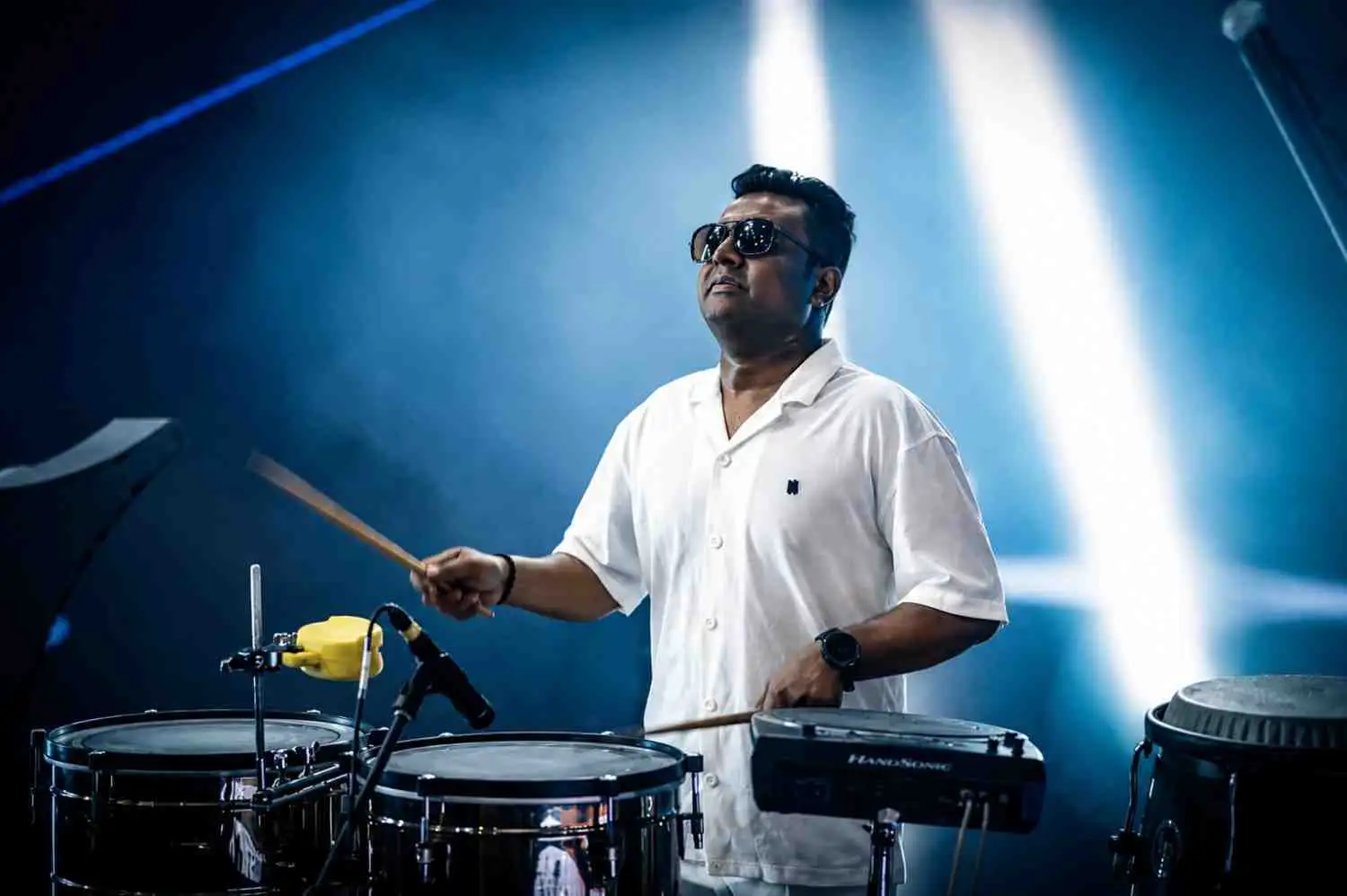 Percussionist Arun with a DJ performing at a corporate event in Bangalore