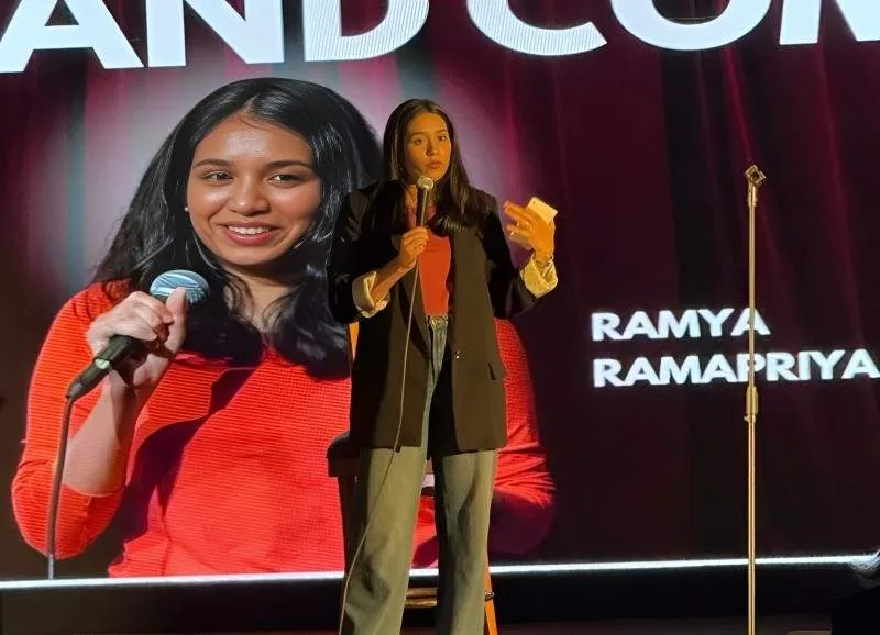 Comedian Ramya Ramapriya performing at a corporate event in Bangalore