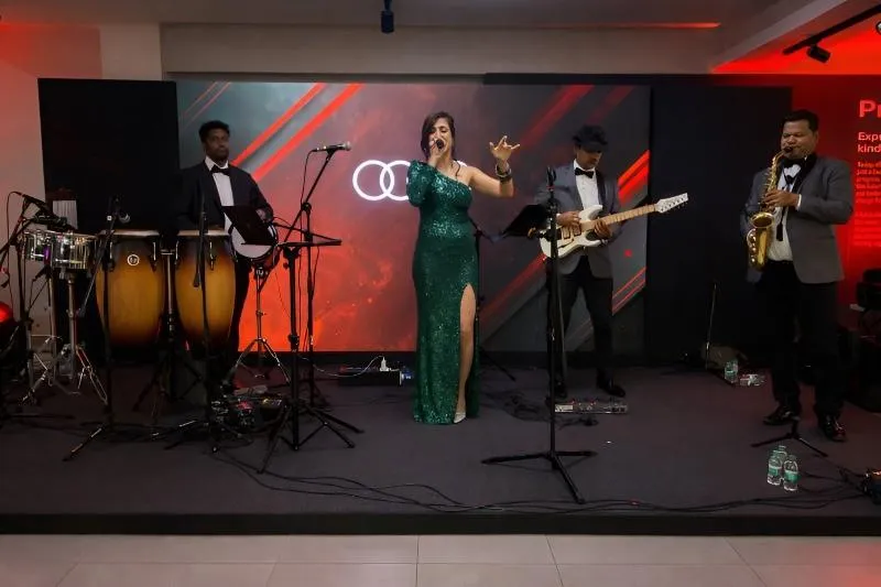 Shazneen Arethna & band performing at a corporate event in Hyderabad