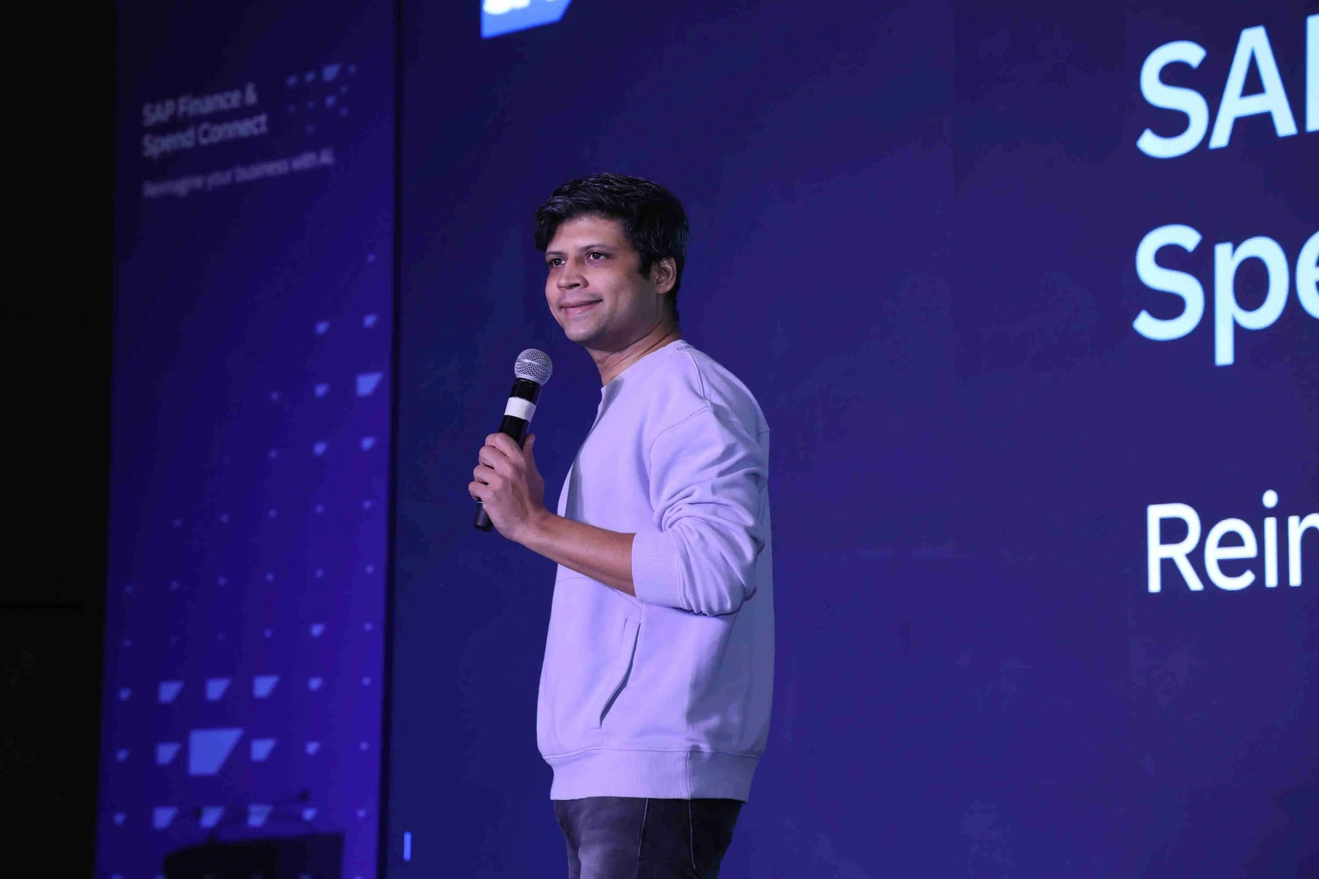 Comedian Rahul Subramanian performing at a corporate event in Delhi