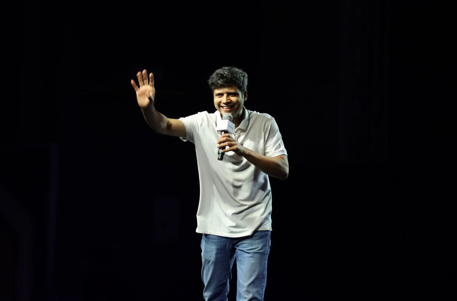 Comedian Rahul Subramanian performing at a corporate event in Mumbai