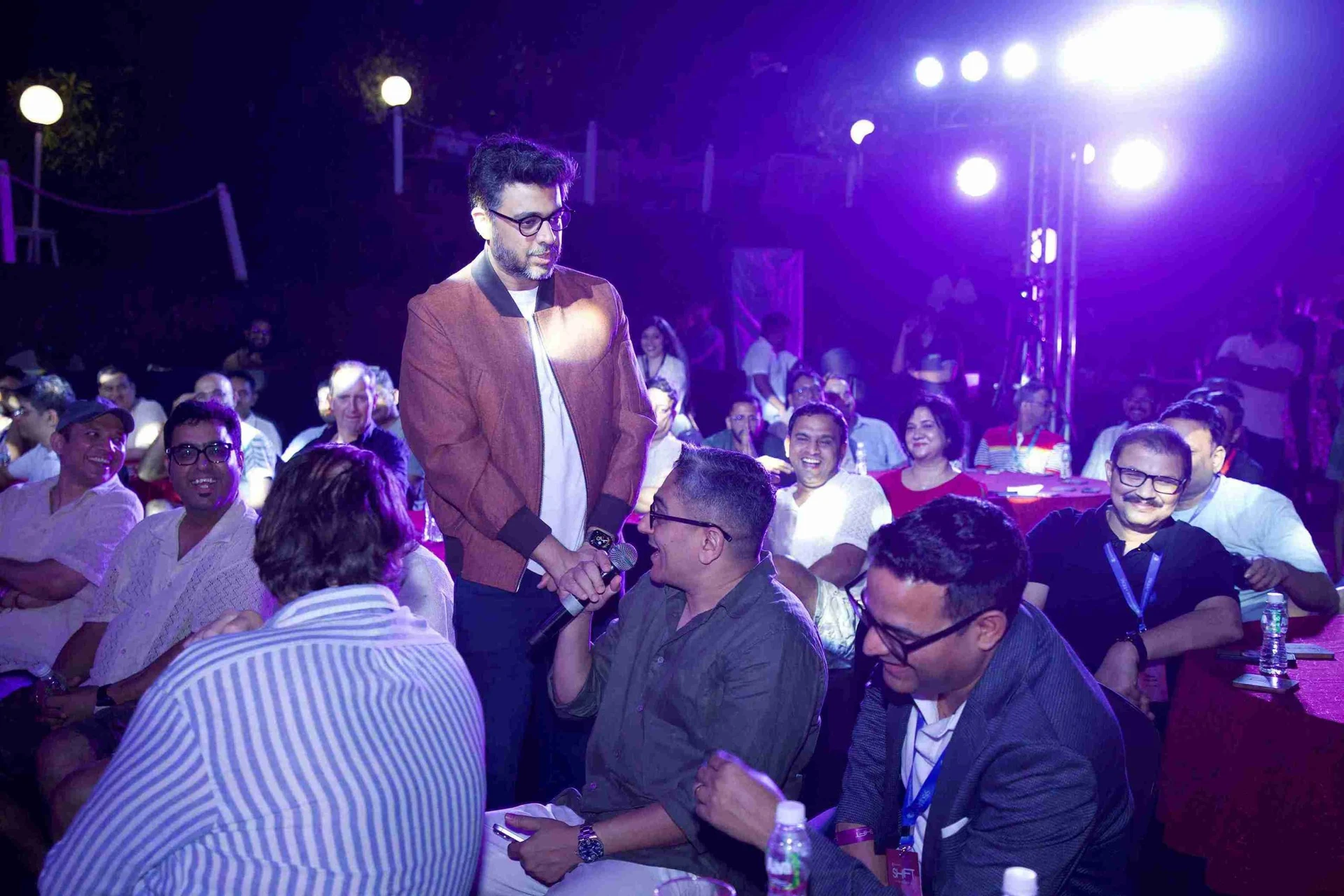 Rohan Joshi performing at a corporate event in Goa