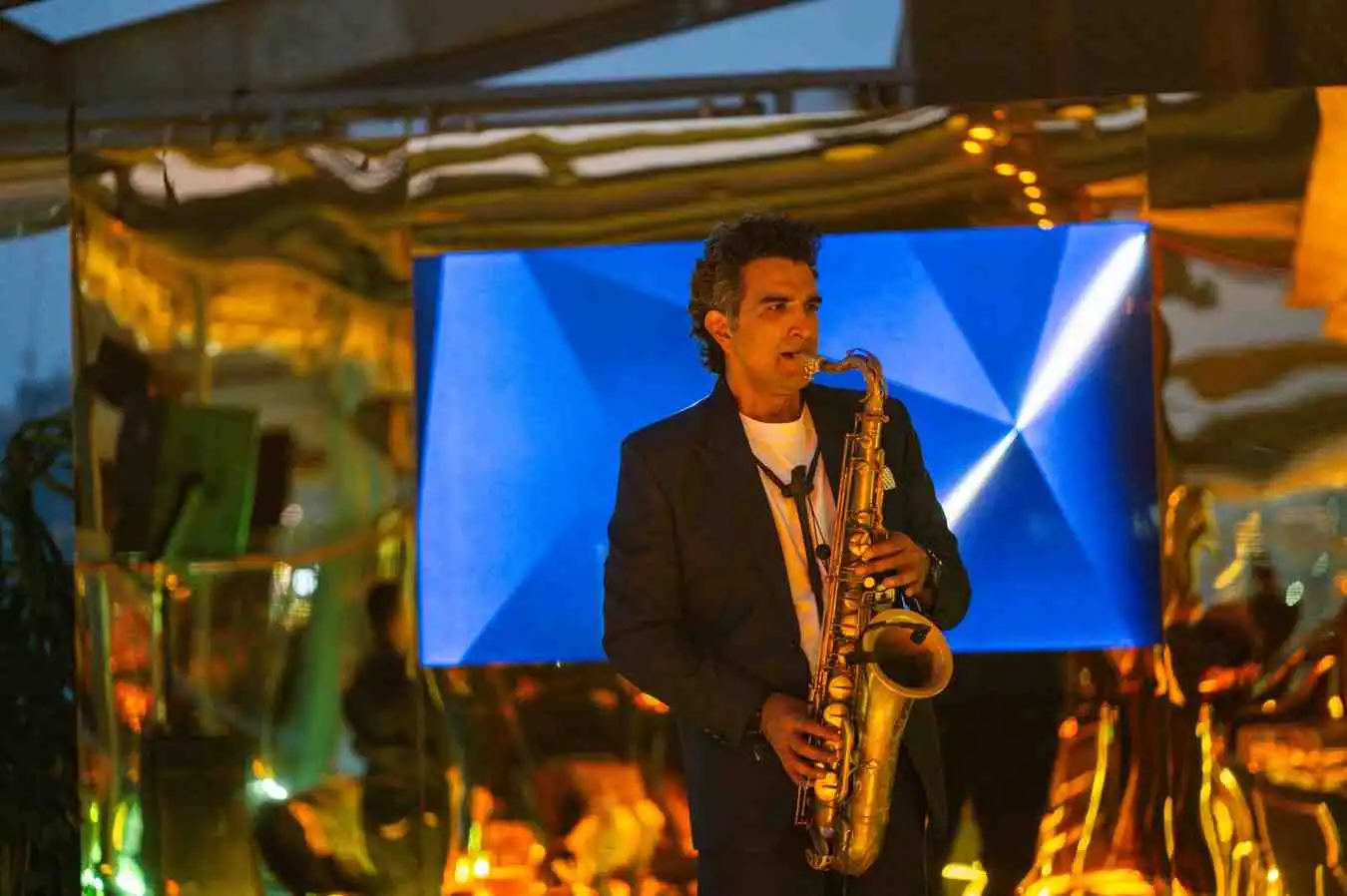 Saxophonist Ryan performing at a corporate event in Mumbai