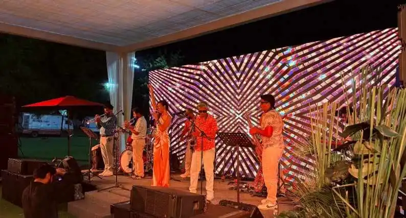 The Bombay Brass feat. Shazneen Arethna performing at a corporate event in Mumbai