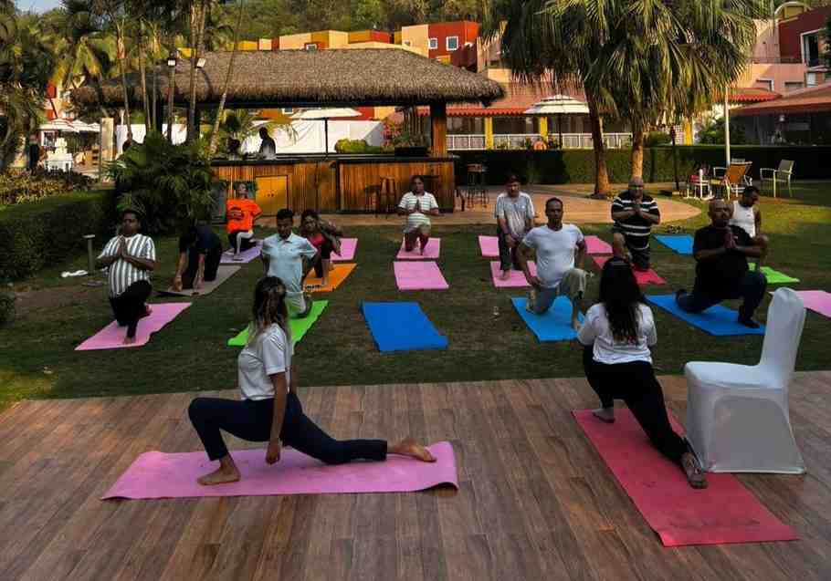 Yoga Instructor Gunjan Kamra teaching yoga at a corporate event in Goa