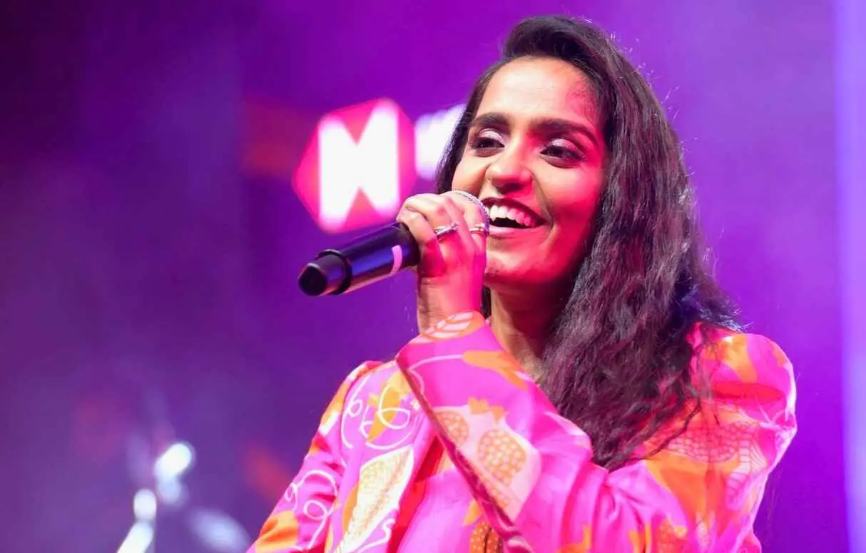 Asees Kaur performing at a corporate event in Amritsar