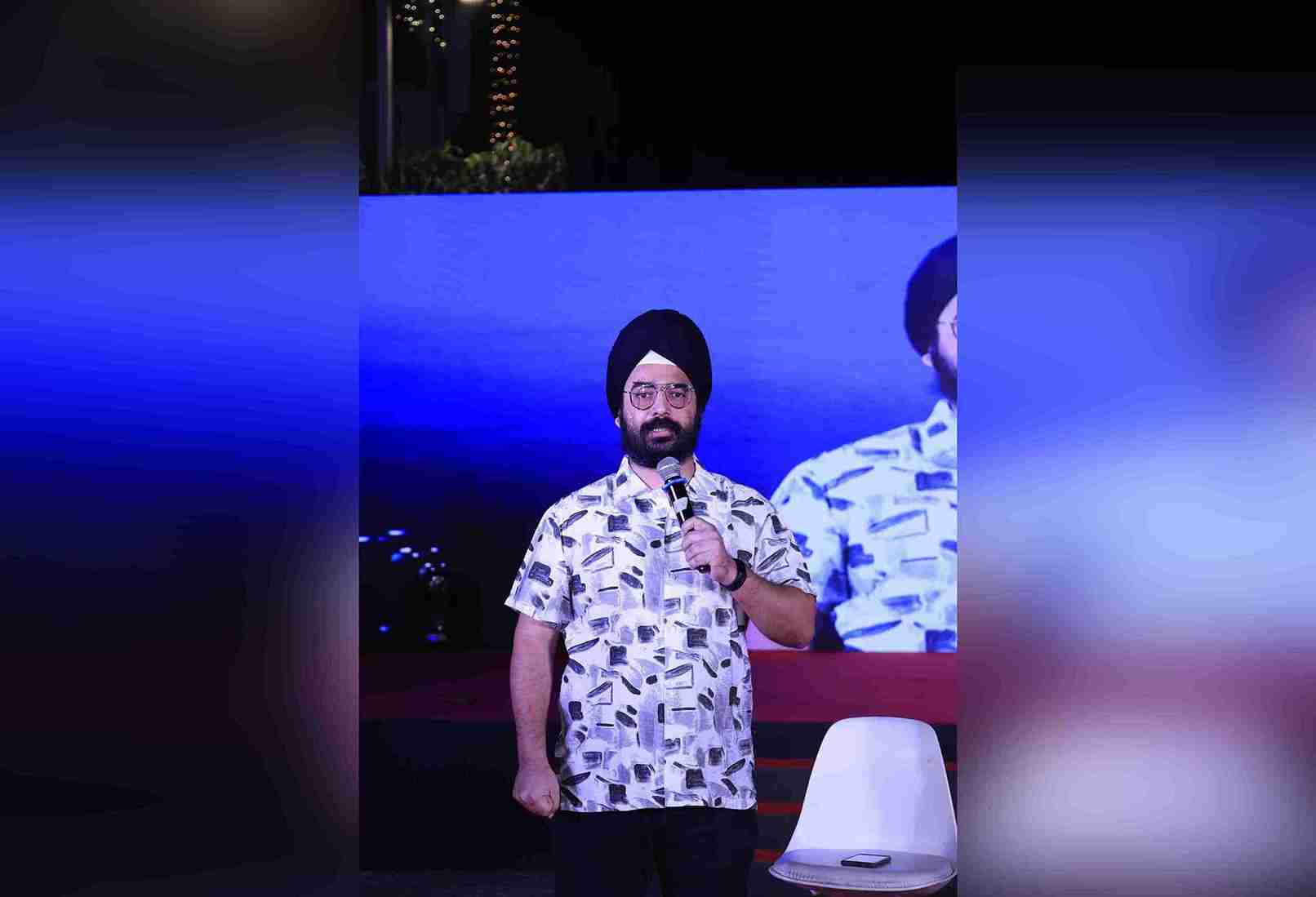 Comedian Angad Singh performing at a corporate event in Gurgaon
