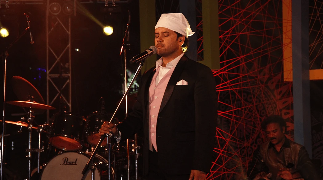 Javed Ali performing at a corporate event in Guwahati