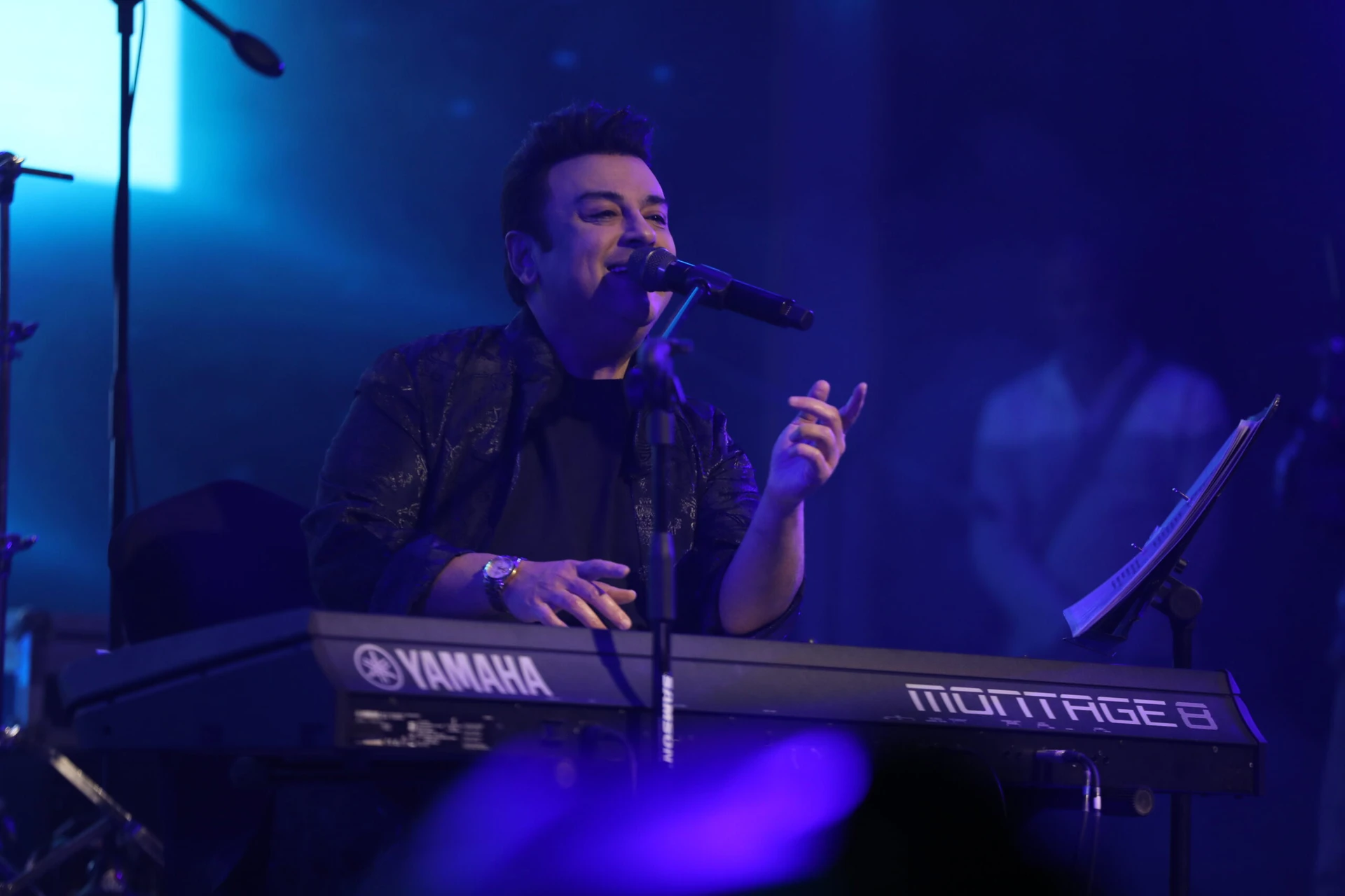 Adnan Sami performing at a corporate event in Mumbai