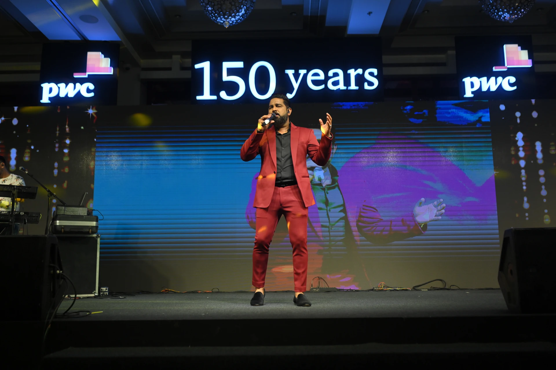 Bhumik Shah performing at a corporate event in Ahmedabad