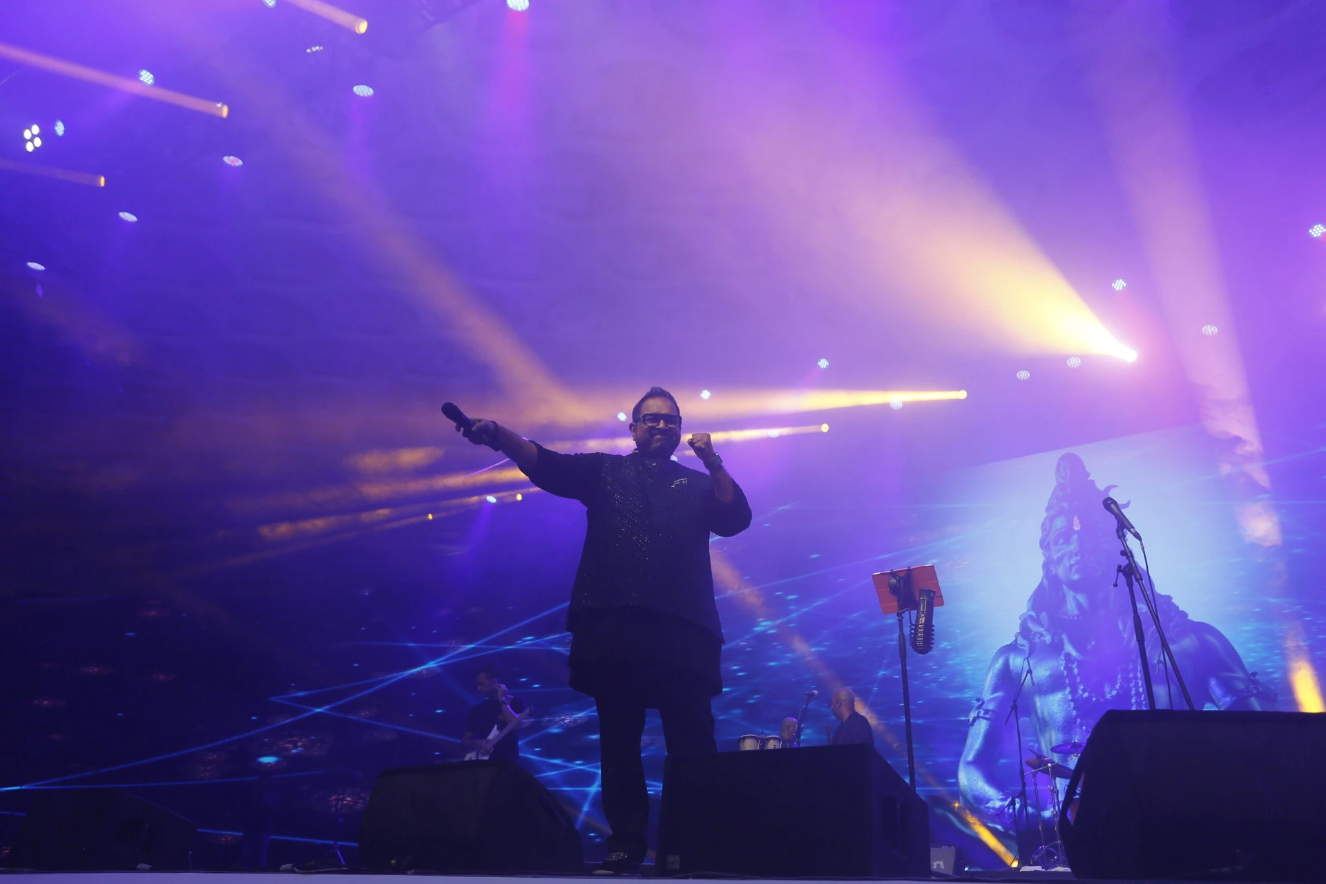 Shankar-Ehsaan-Loy performing at a corporate event in Mumbai