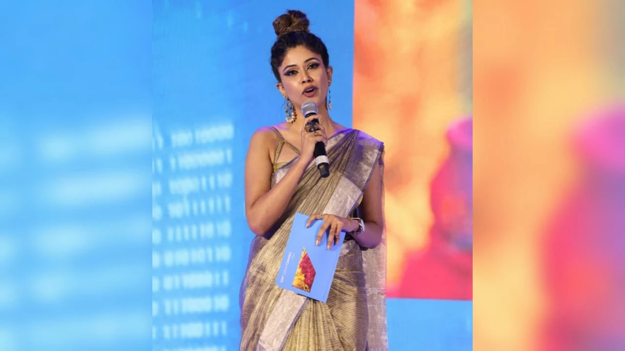 Shikha Singh hosting a corporate event in Delhi