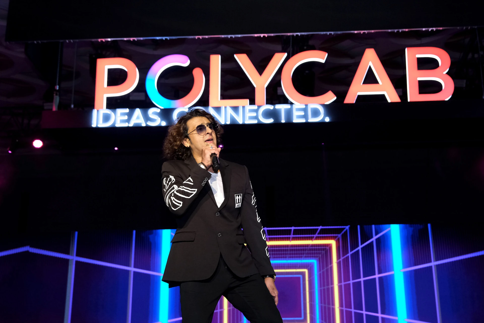 Sonu Nigam performing at a corporate event in Mumbai