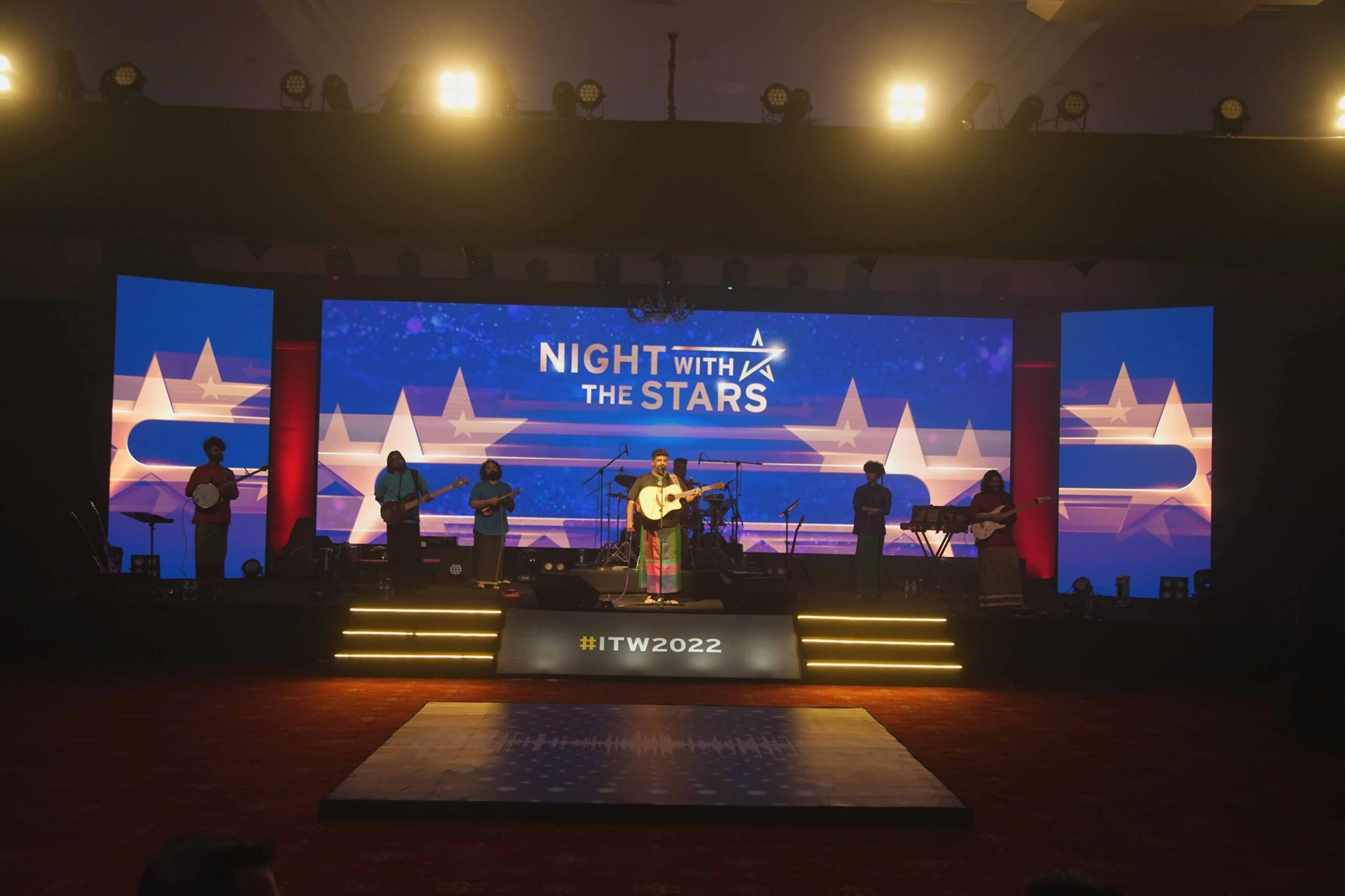 The Raghu Dixit Project performing at a corporate event in Kovalam