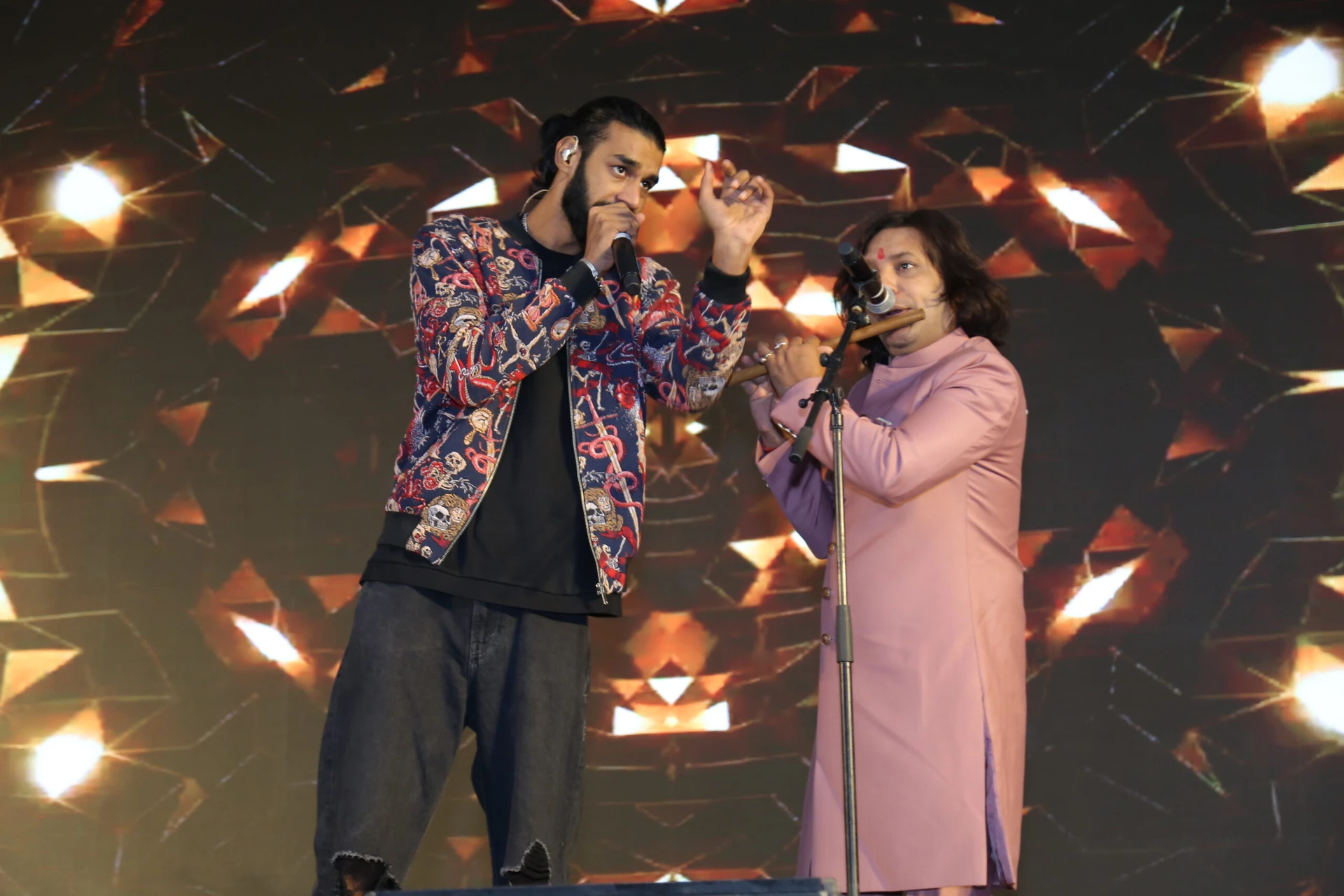 Divyansha and Manuraj performing at a corporate event in Delhi