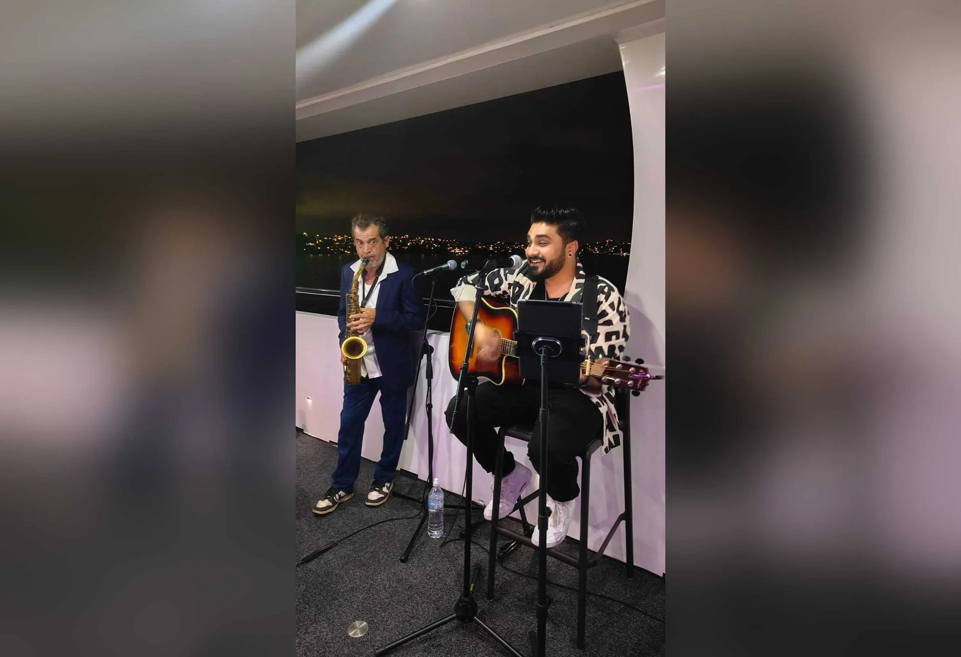 Bollywood Singer with a Saxophonist performing at a corporate event in Sydney