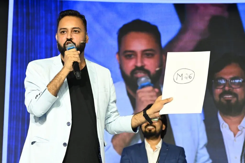 Mentalist Akshay Laxman performing at an event for Adobe in Mumbai