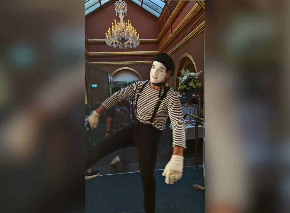 A Mime artist performing at a conference for HASE in Sydney